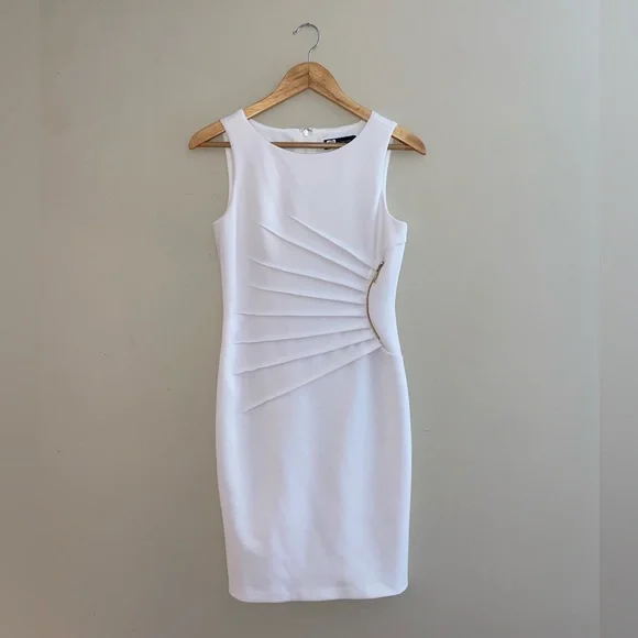 White dress with gold zipper detail